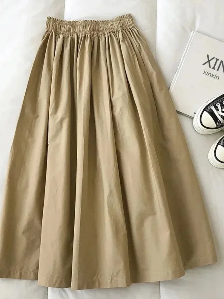 New Skirt Ladie Fashion Women Pockets Pleated Knee Length Skirts Solid Color Casual High Waist A Line Woman Skirts Elegant 2024